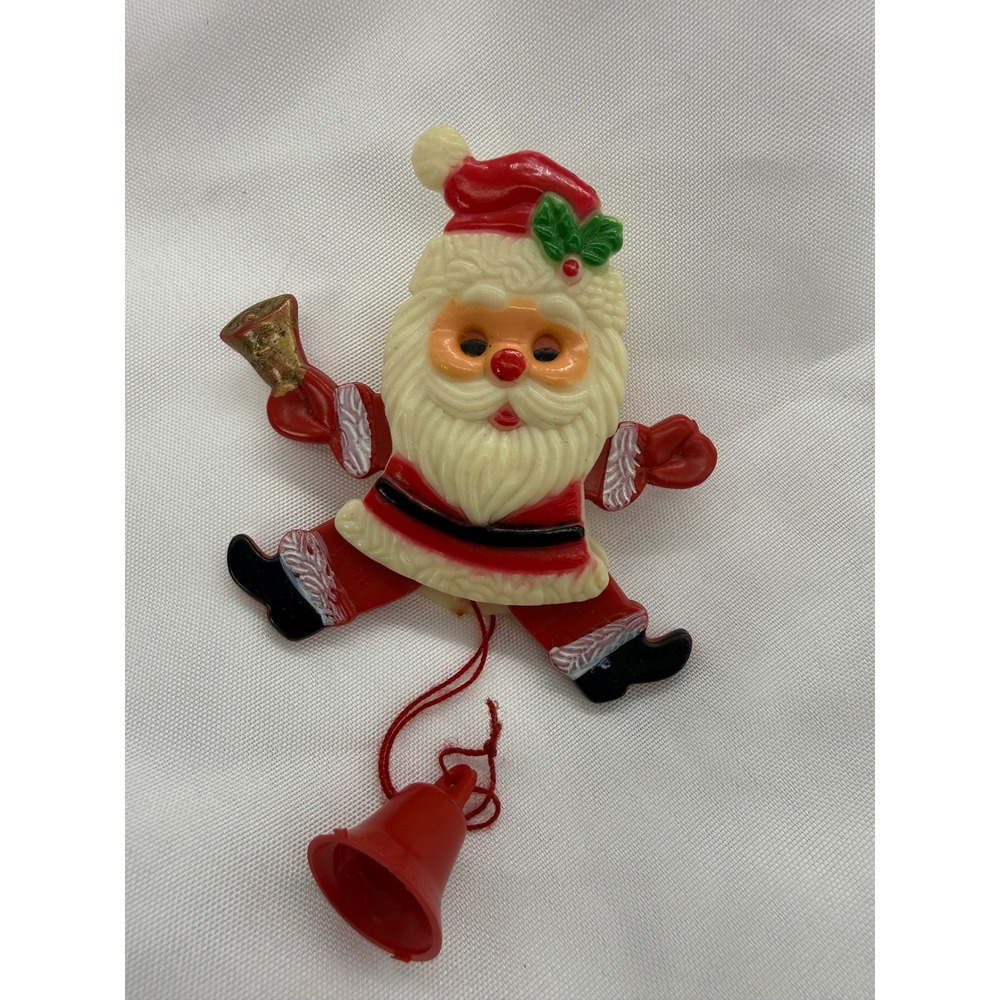 Vintage Plastic Jumping Pin Santa Claus Pull Down Bell Brooch Holiday Jewelry